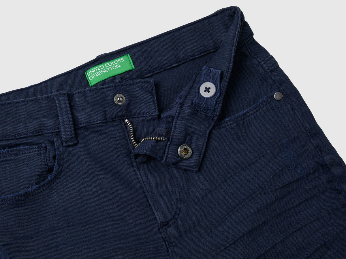 Jeans stretch con rotture