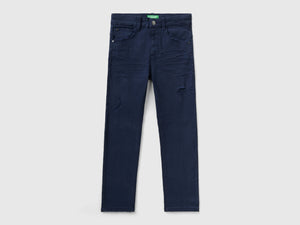Jeans stretch con rotture