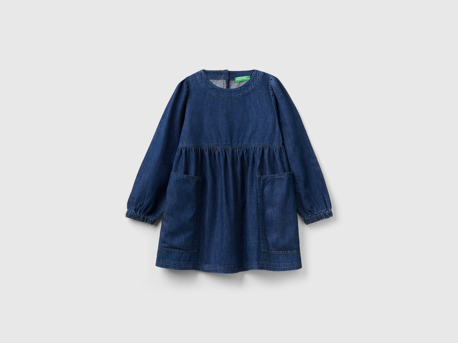 Vestito di jeans con tasche da bambina azzurro | Benetton Outlet