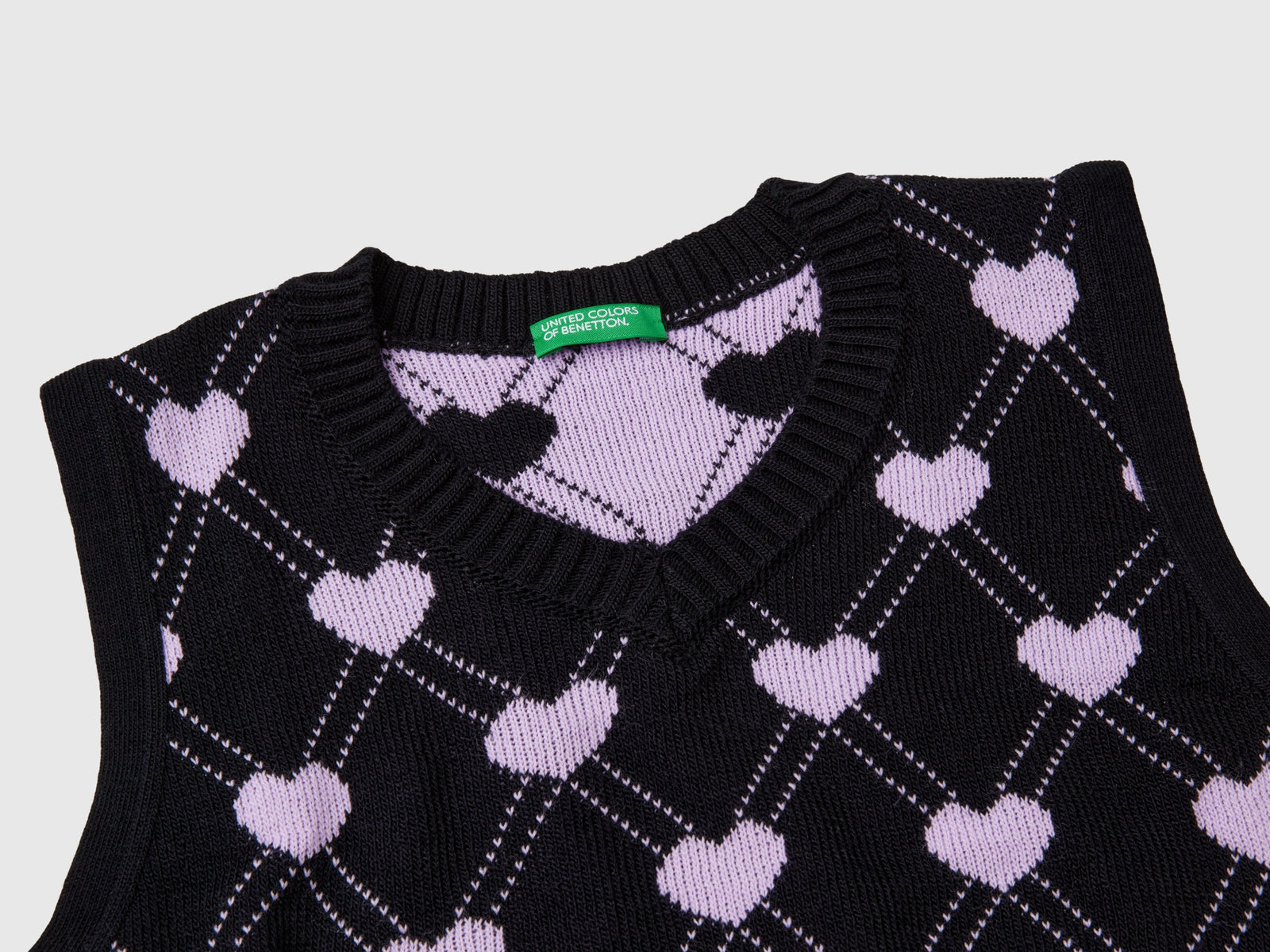 Gilet cropped con motivo cuori da bambina nero 3 | Benetton Outlet