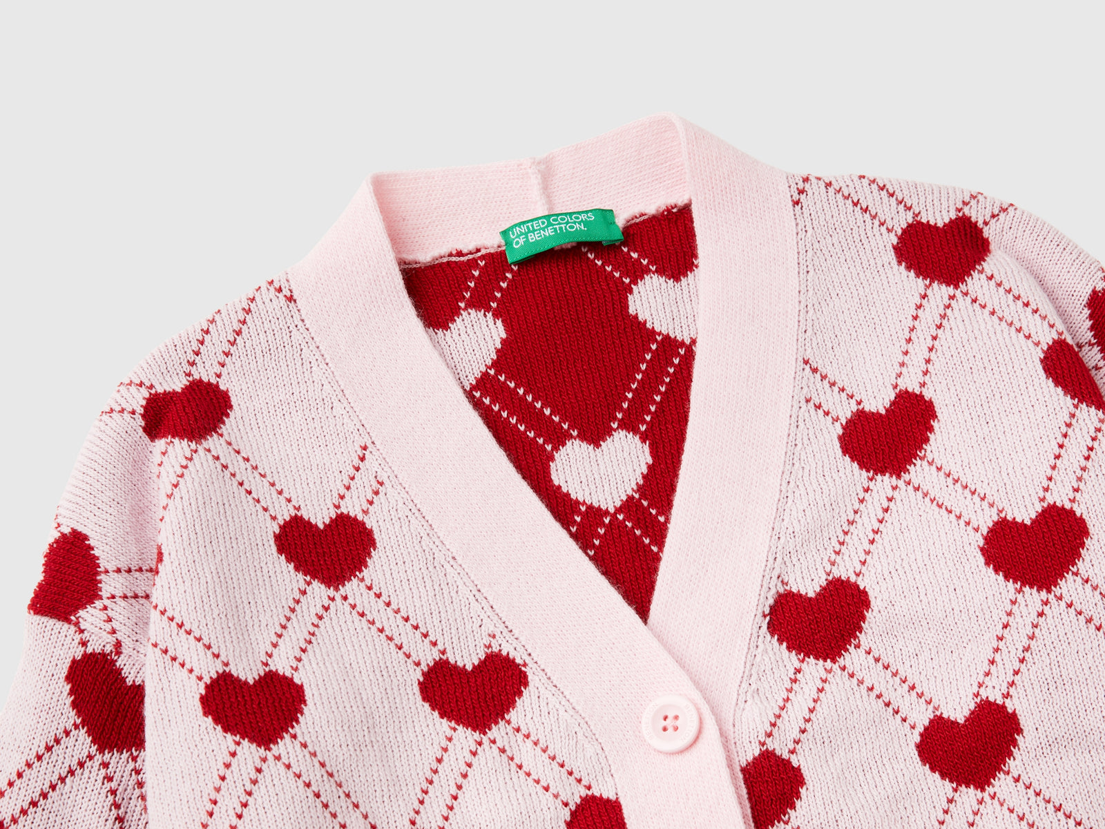 Cardigan con motivo cuori da bambina rosa 3 | Benetton Outlet