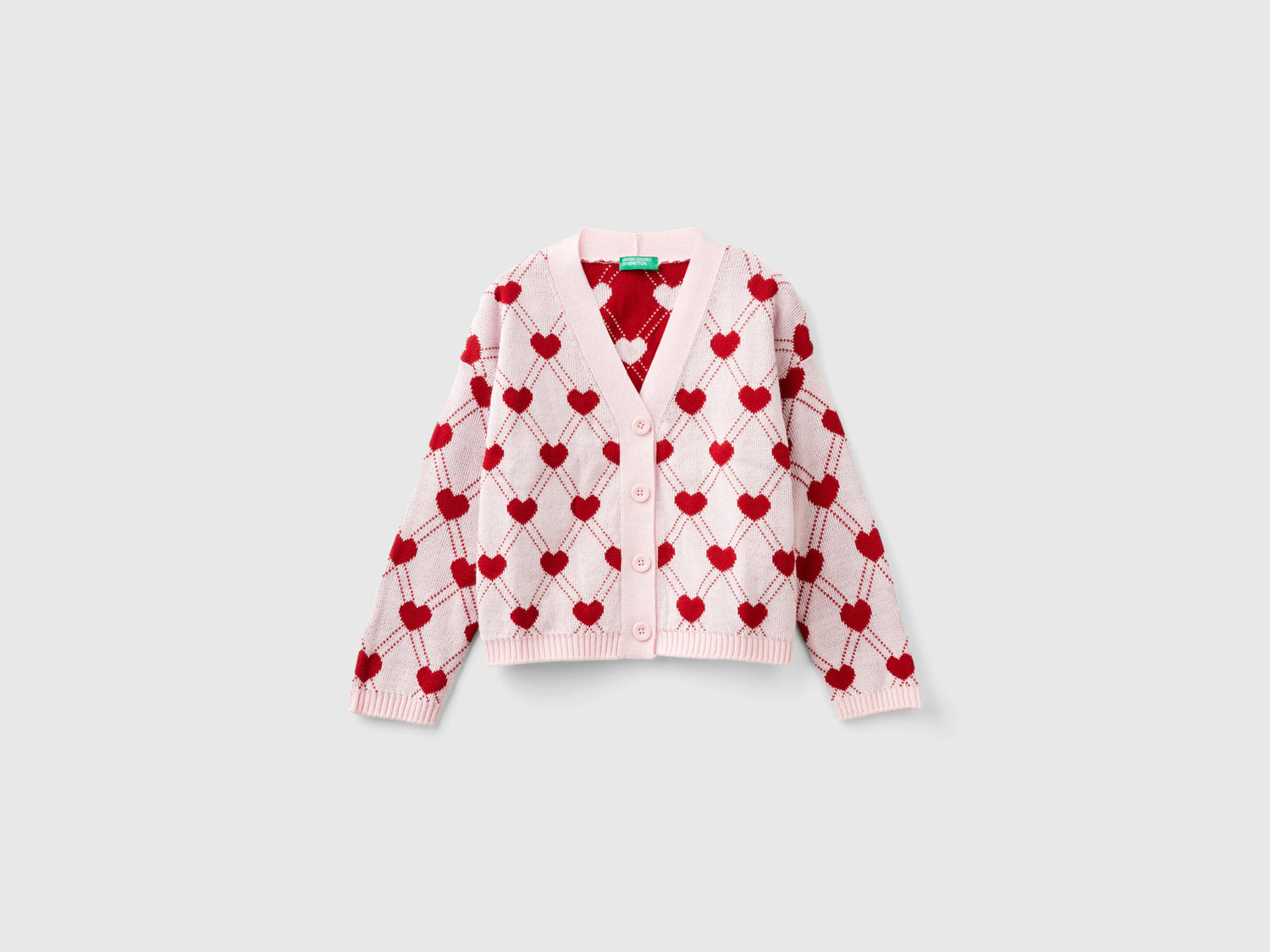 Cardigan con motivo cuori da bambina rosa | Benetton Outlet