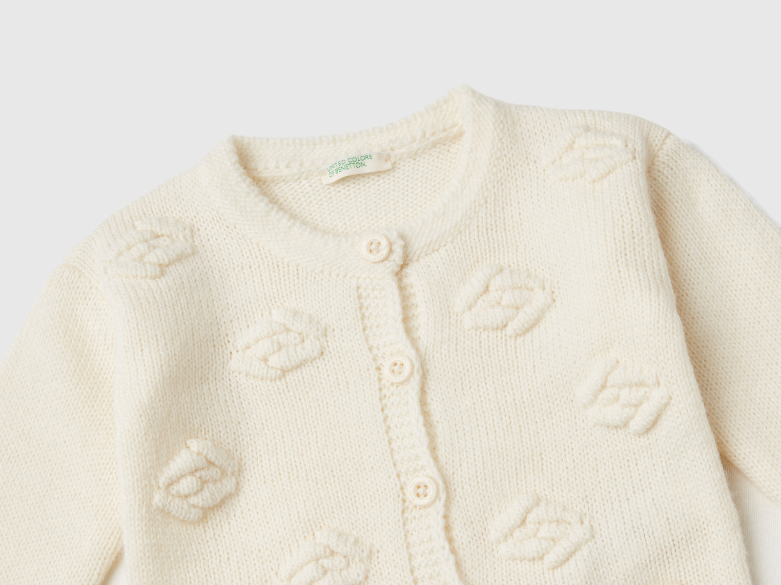 Cardigan con rose in misto lana da neonato bianco panna 3 | Benetton Outlet