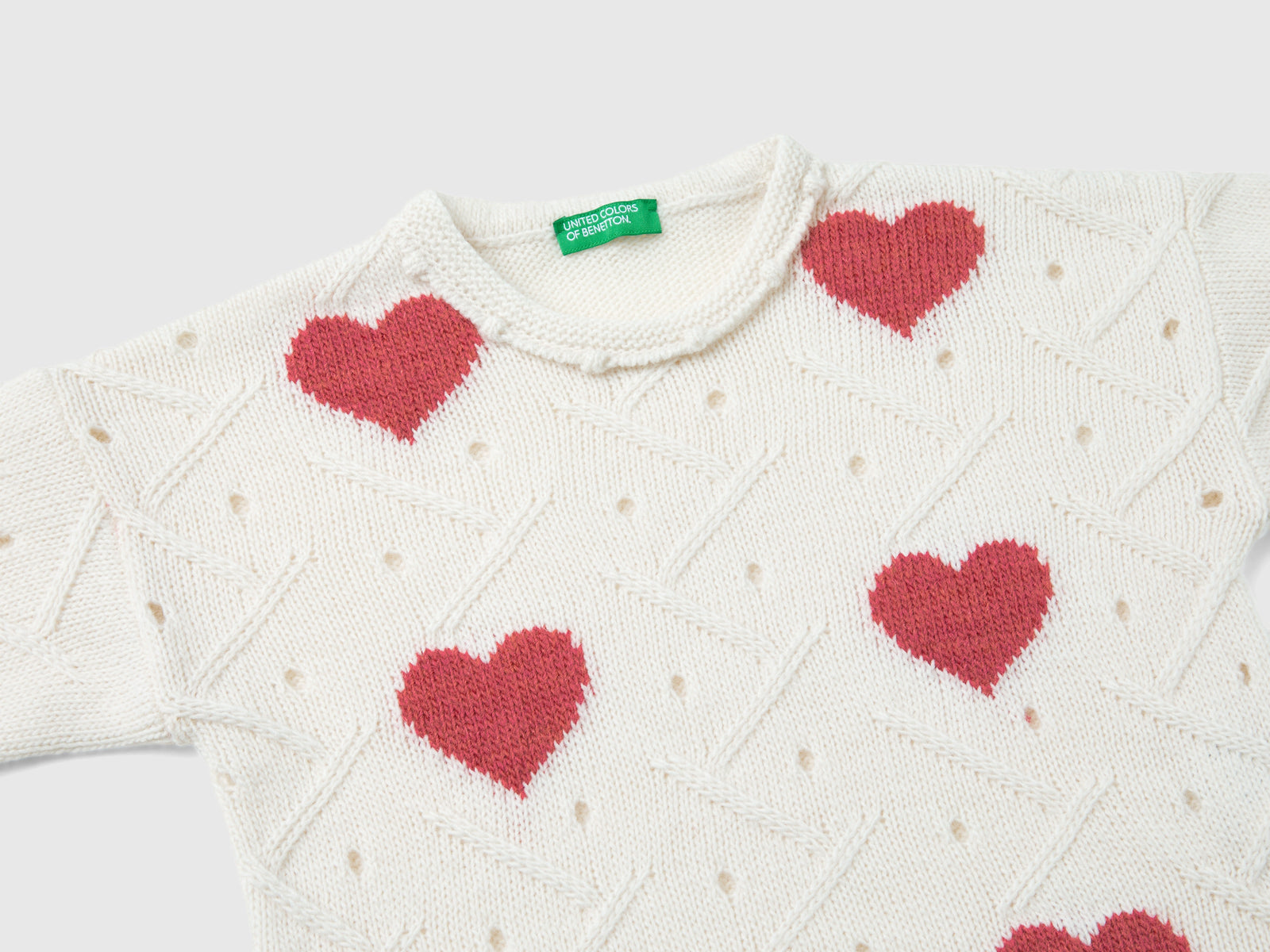 Maglia con intarsio cuori da bimba bianco panna 3 | Benetton Outlet
