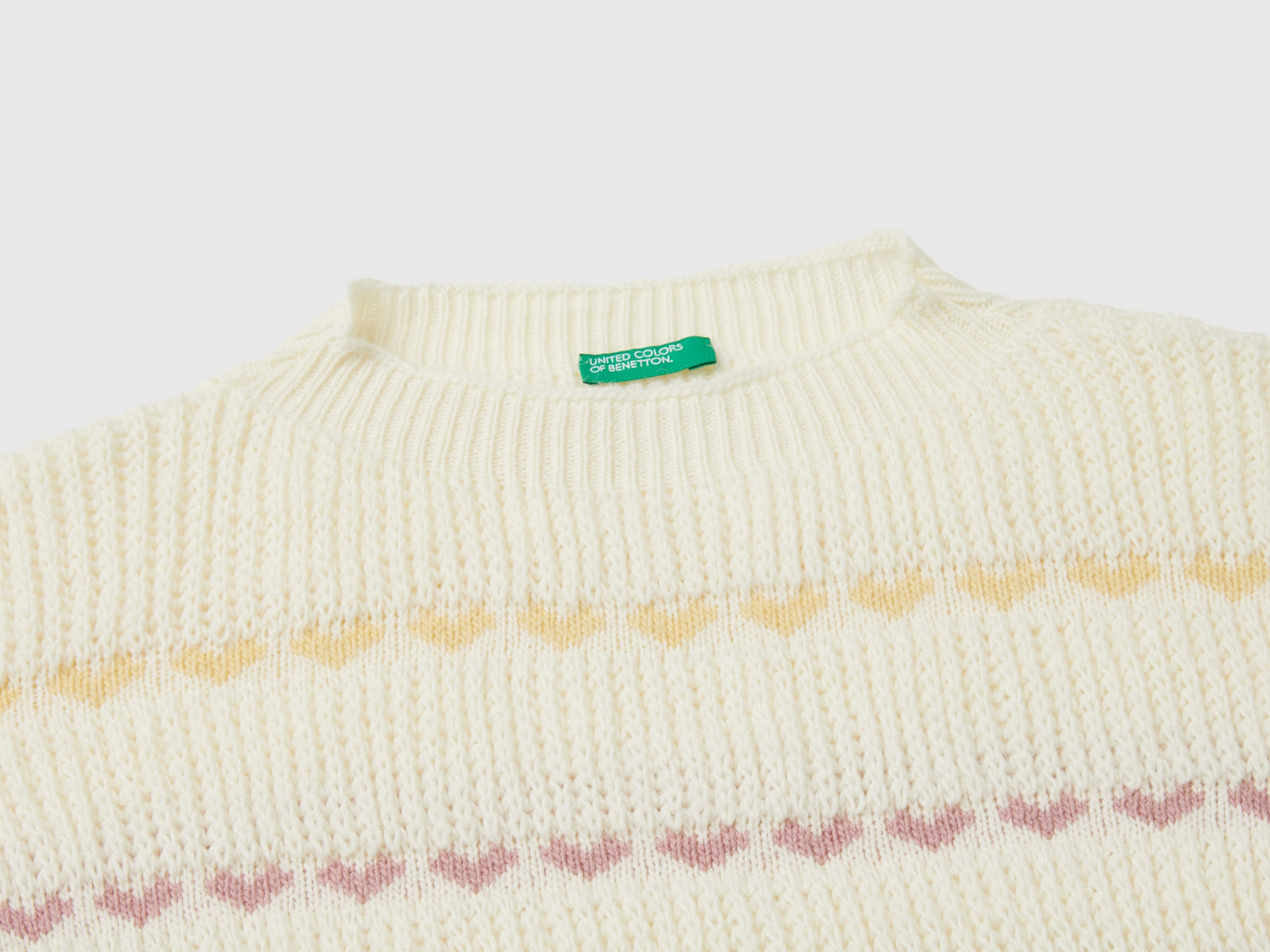 Maglioncino con intarsio cuori da bambina bianco panna 3 | Benetton Outlet