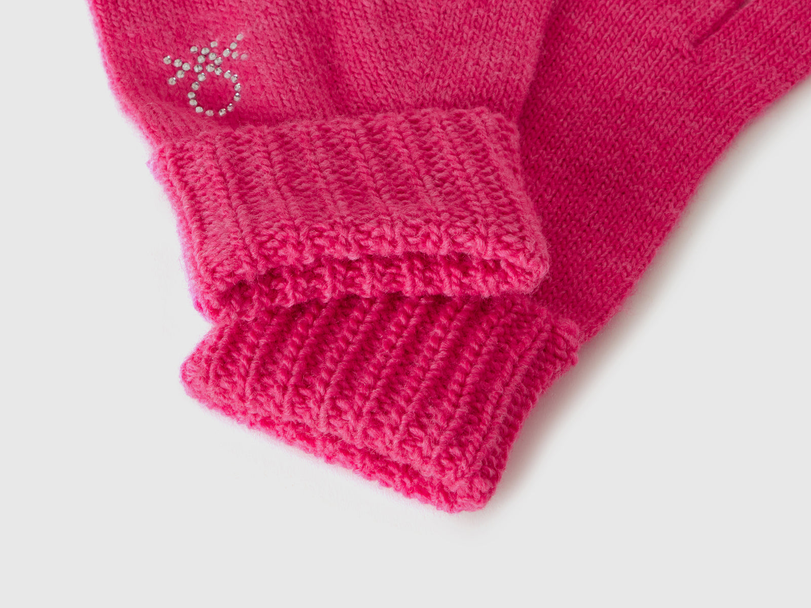 Guanti in maglia con logo da bambina fucsia 3 | Benetton Outlet