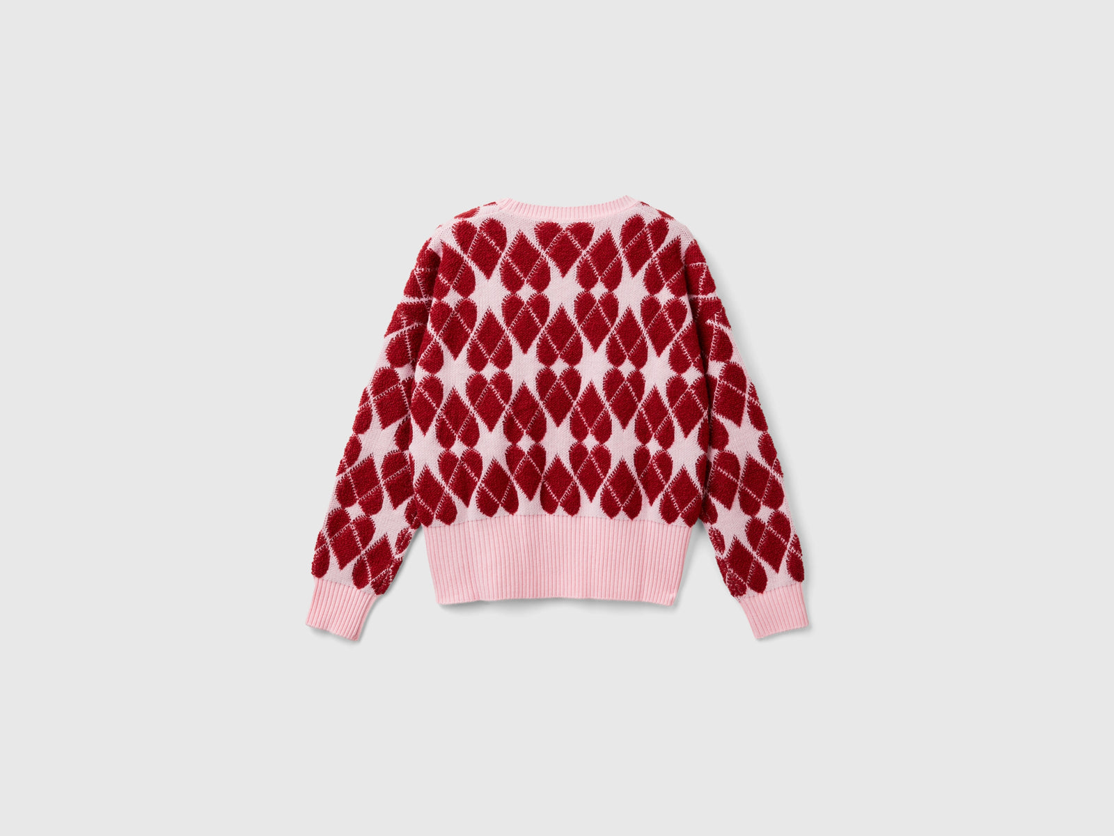 Maglia a cuori jacquard da bambina rosa 2 | Benetton Outlet