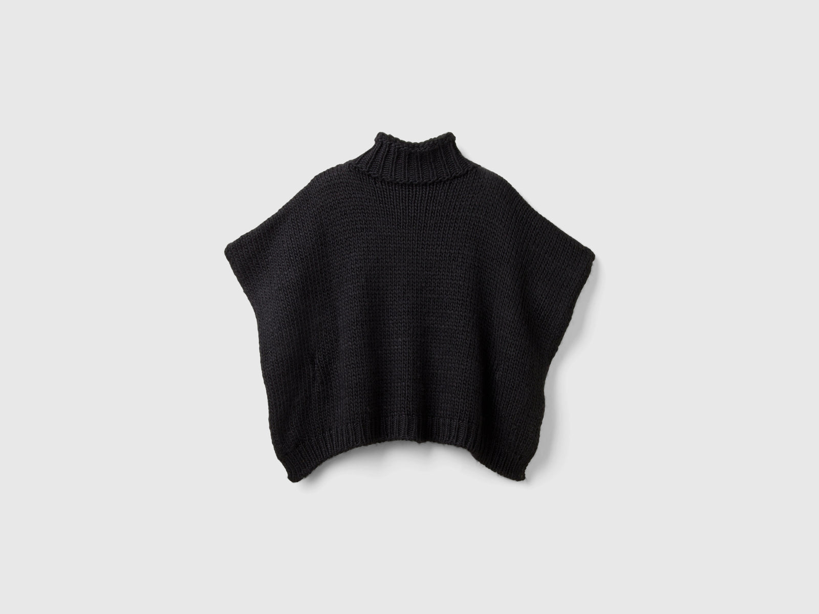 Mantella lavorata con lurex da bambina nero 2 | Benetton Outlet