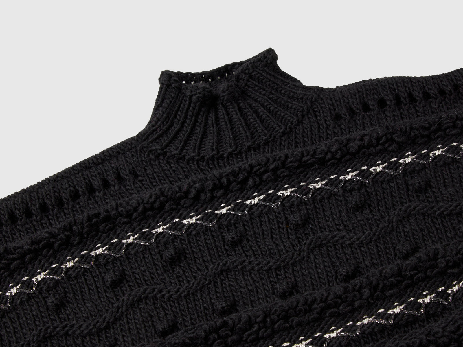 Mantella lavorata con lurex da bambina nero 3 | Benetton Outlet