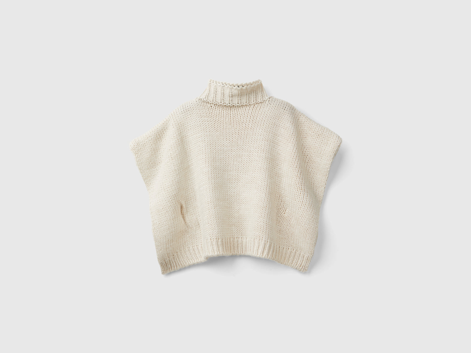 Mantella lavorata con lurex da bambina bianco panna 2 | Benetton Outlet