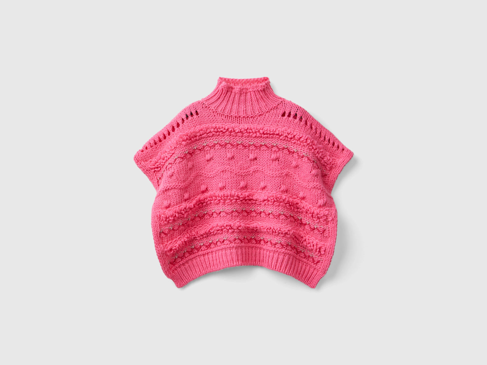 Mantella lavorata con lurex da bambina fucsia | Benetton Outlet