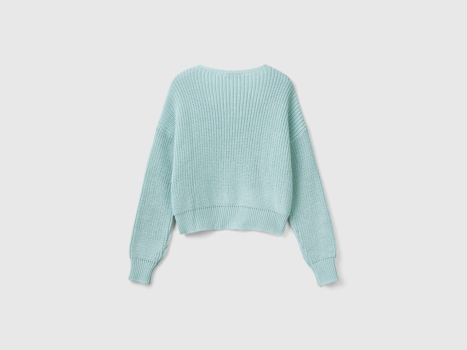 Maglia boxy fit da bambina verde acqua 2 | Benetton Outlet