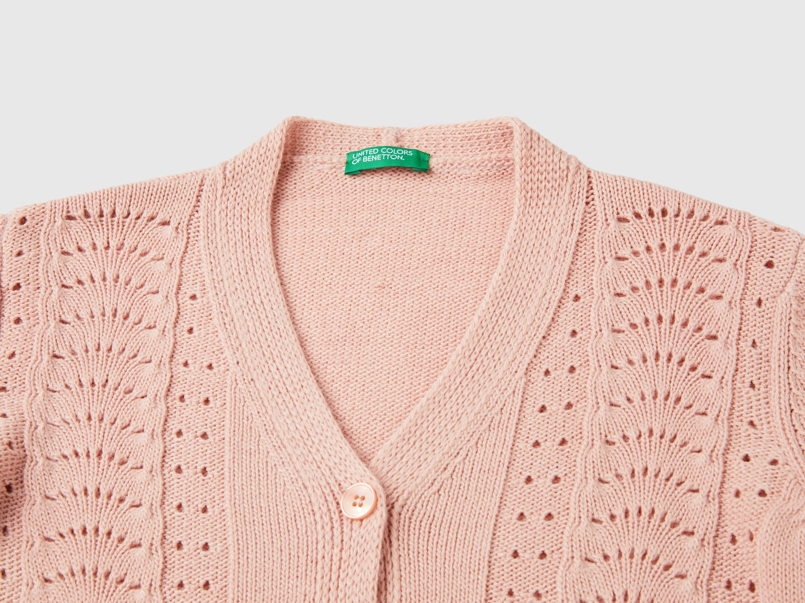 Cardigan con trafori da bambina rosa tenue 3 | Benetton Outlet