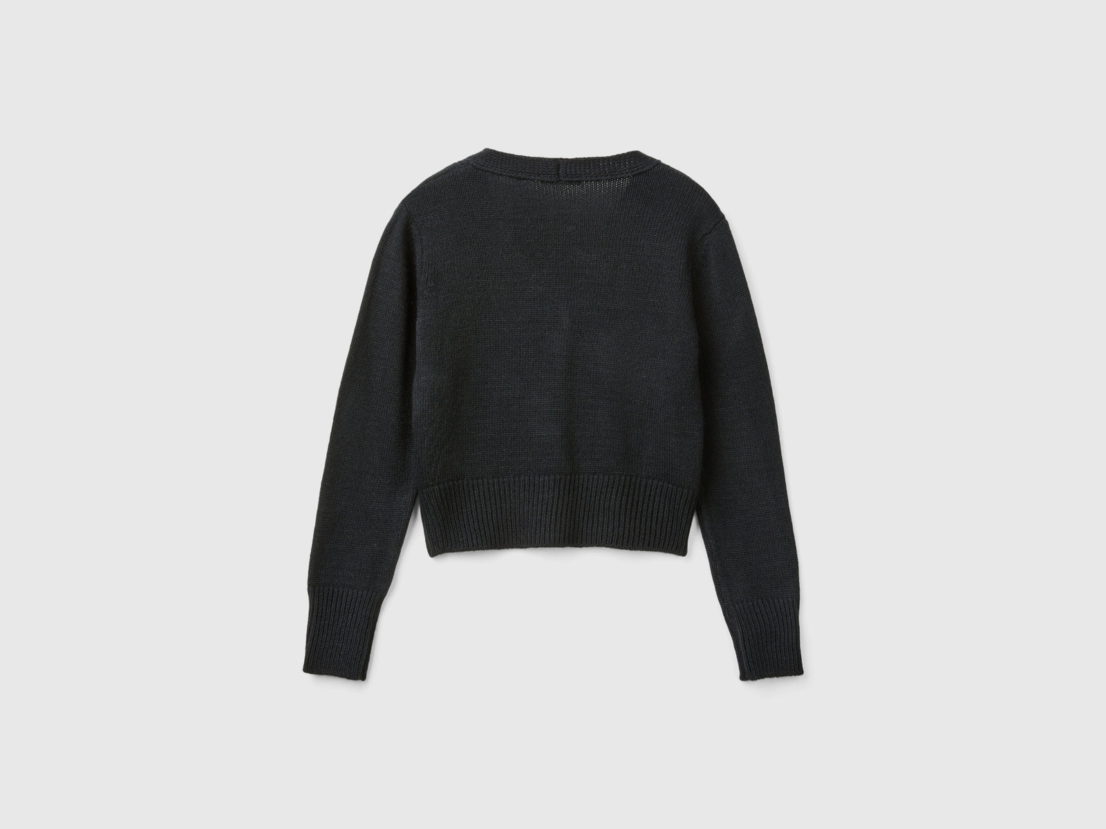 Cardigan con trafori da bambina nero 2 | Benetton Outlet