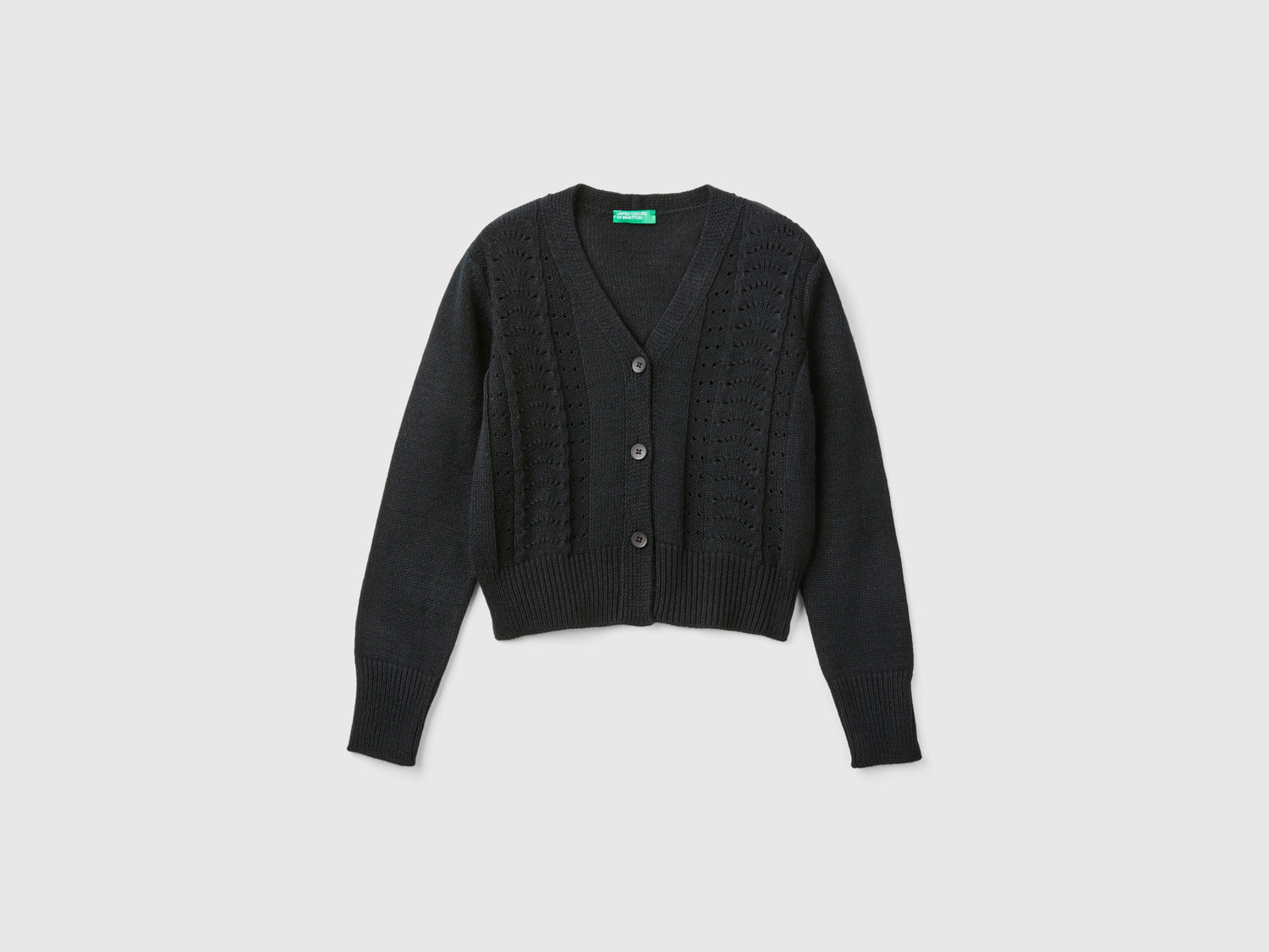 Cardigan con trafori da bambina nero | Benetton Outlet