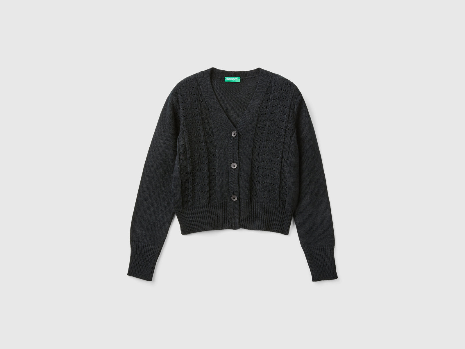 Cardigan con trafori da bambina nero | Benetton Outlet