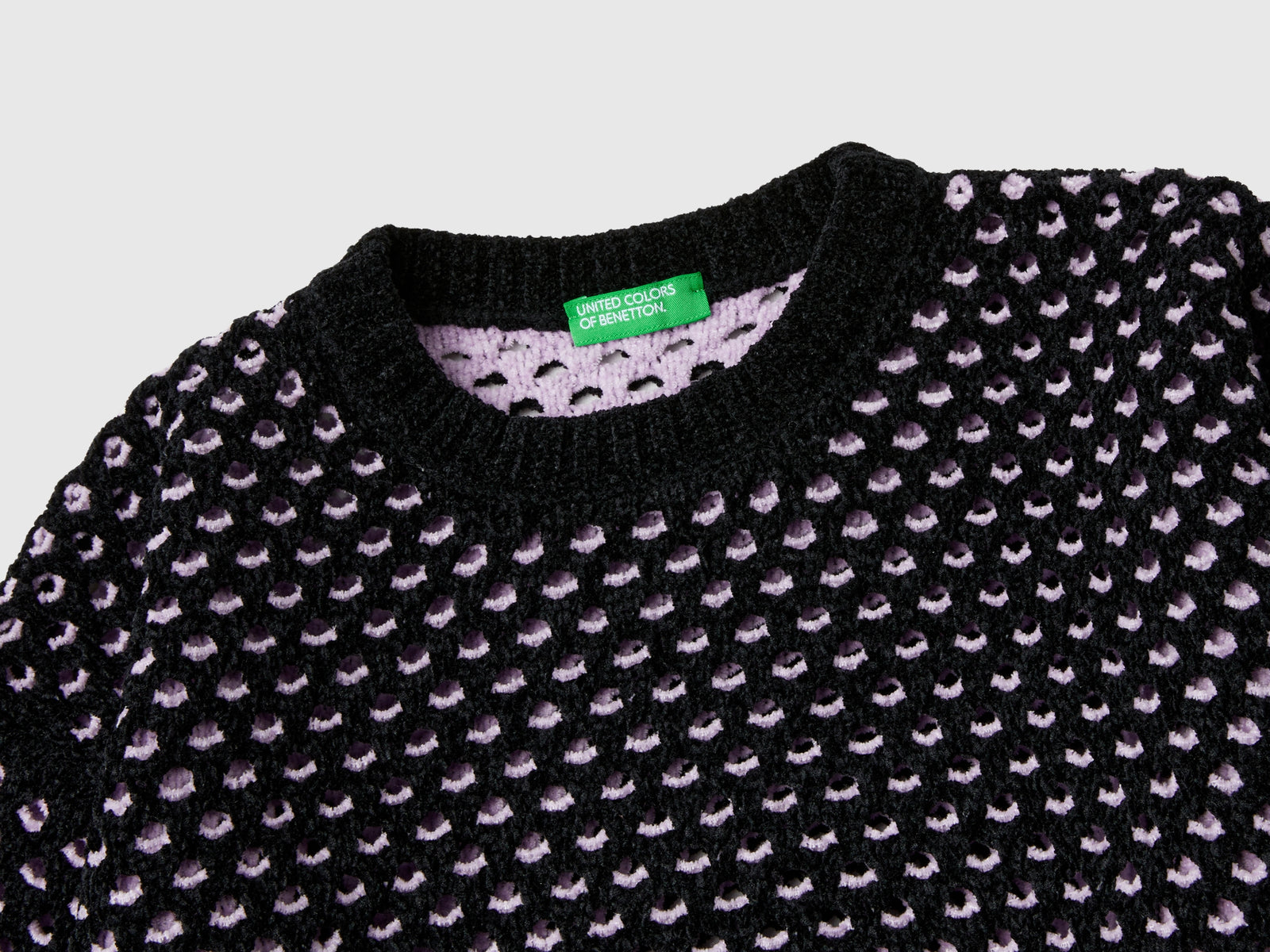 Maglia boxy fit in ciniglia da bambina nero 3 | Benetton Outlet