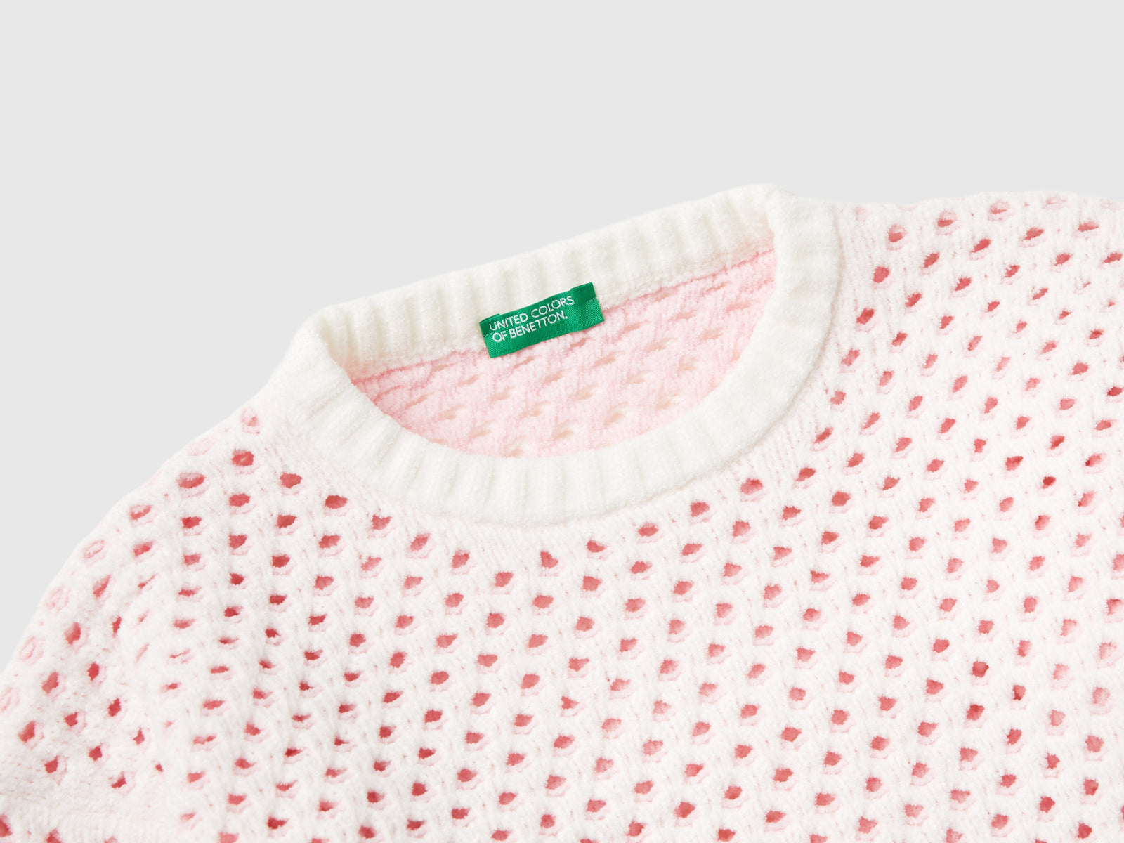 Maglia boxy fit in ciniglia da bambina bianco 3 | Benetton Outlet