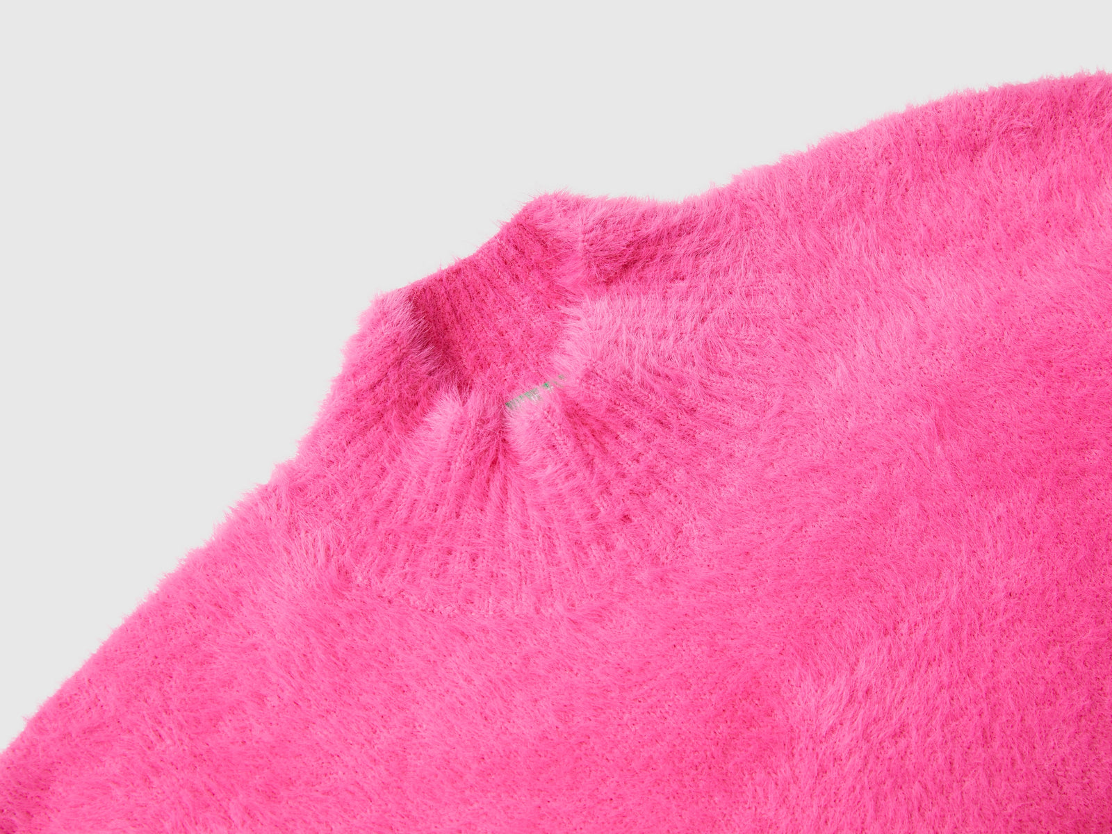 Maglia in filato peloso da bambina rosa 3 | Benetton Outlet
