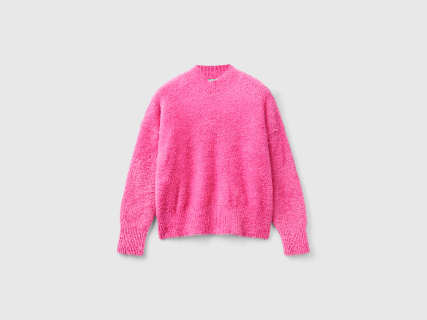Maglia in filato peloso da bambina rosa | Benetton Outlet