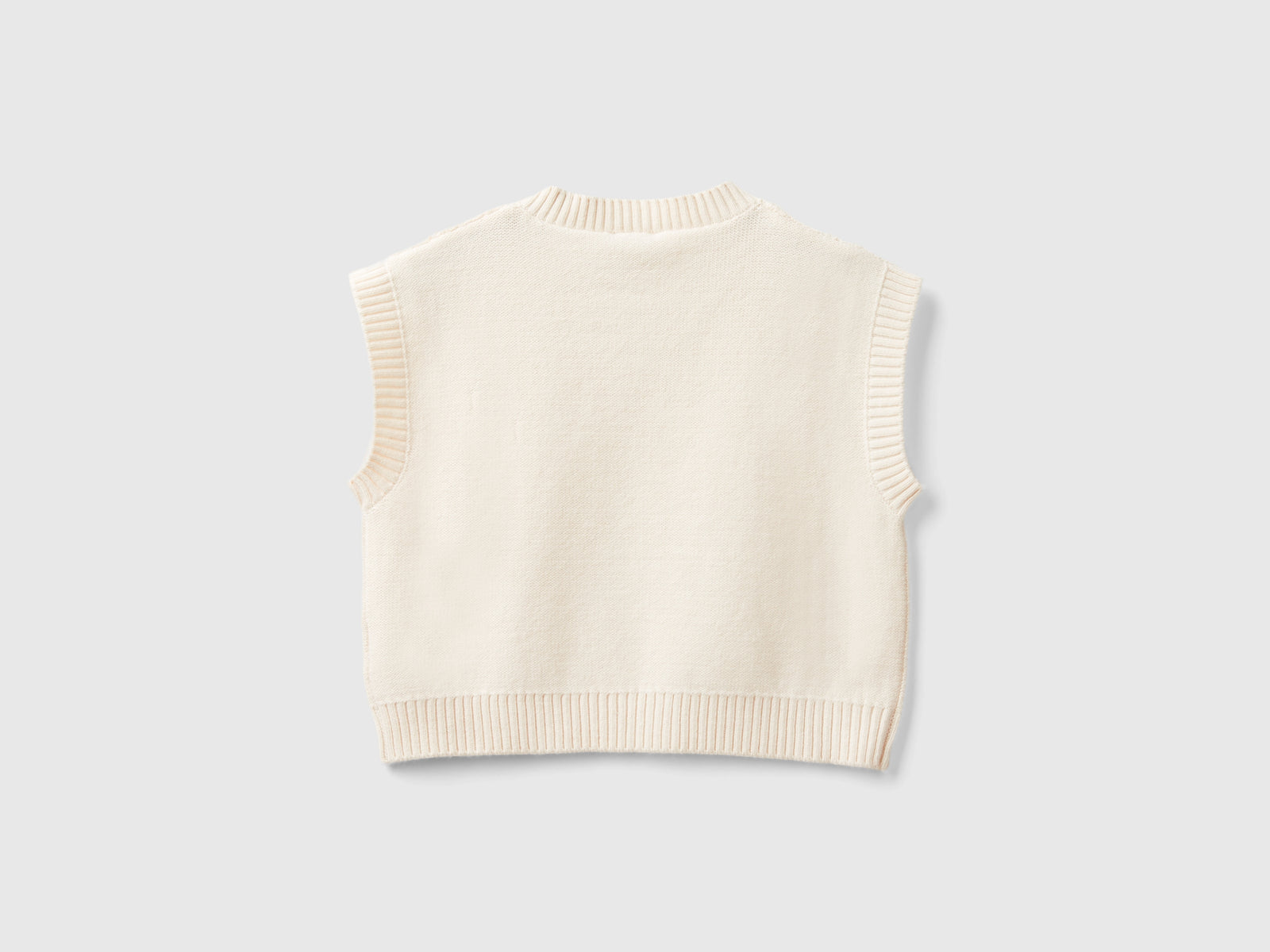 Gilet lavorato da bambina bianco panna 2 | Benetton Outlet