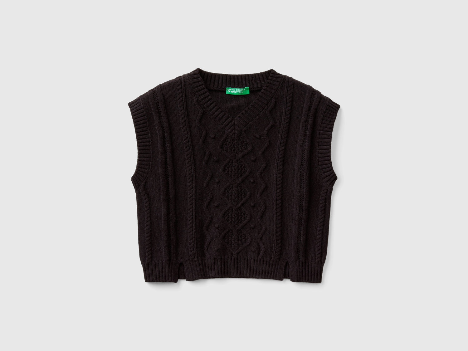 Gilet lavorato da bambina nero | Benetton Outlet