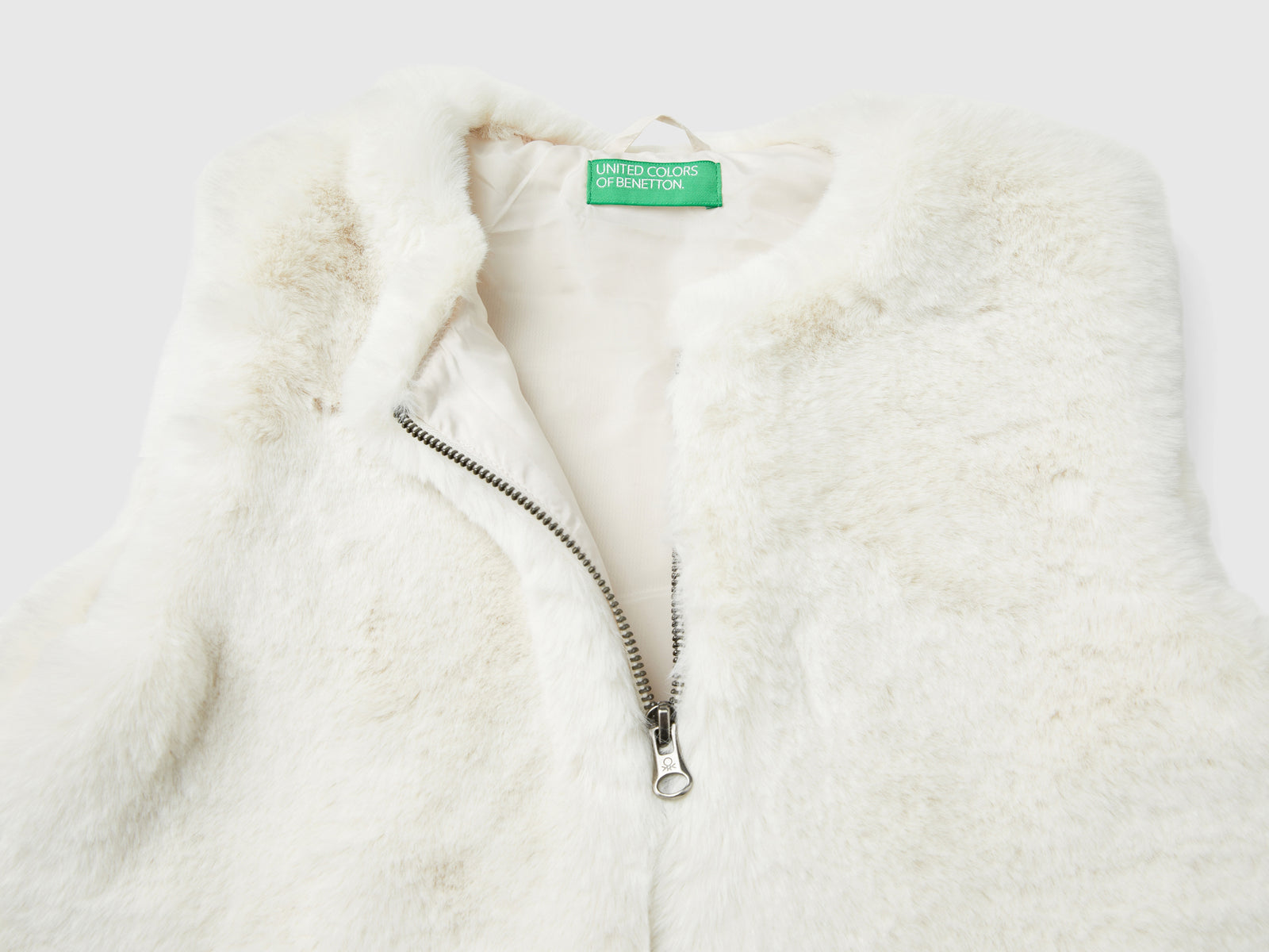 chaleco de piel sintética da bambina bianco panna 3 | Benetton Outlet