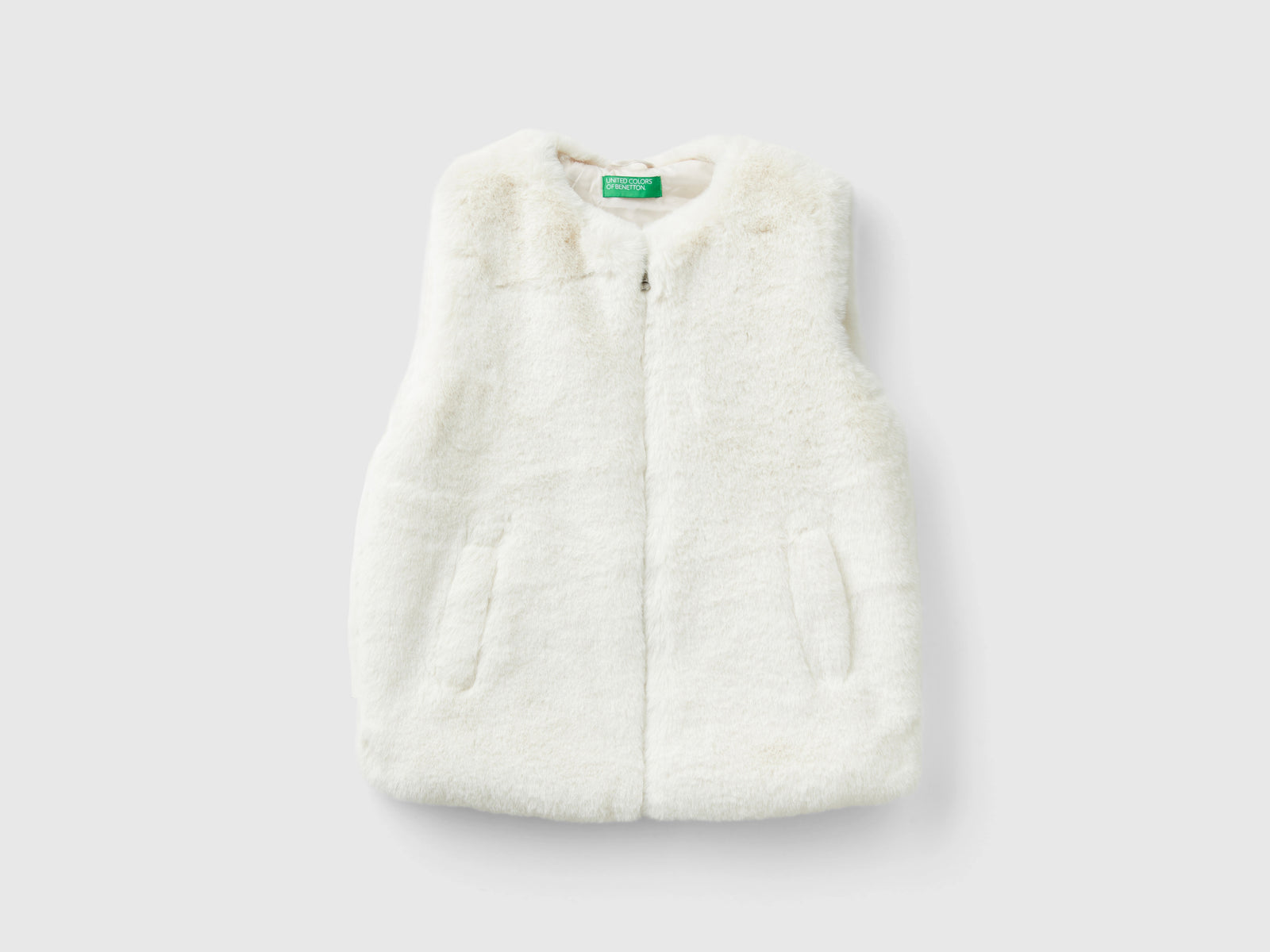 chaleco de piel sintética da bambina bianco panna | Benetton Outlet
