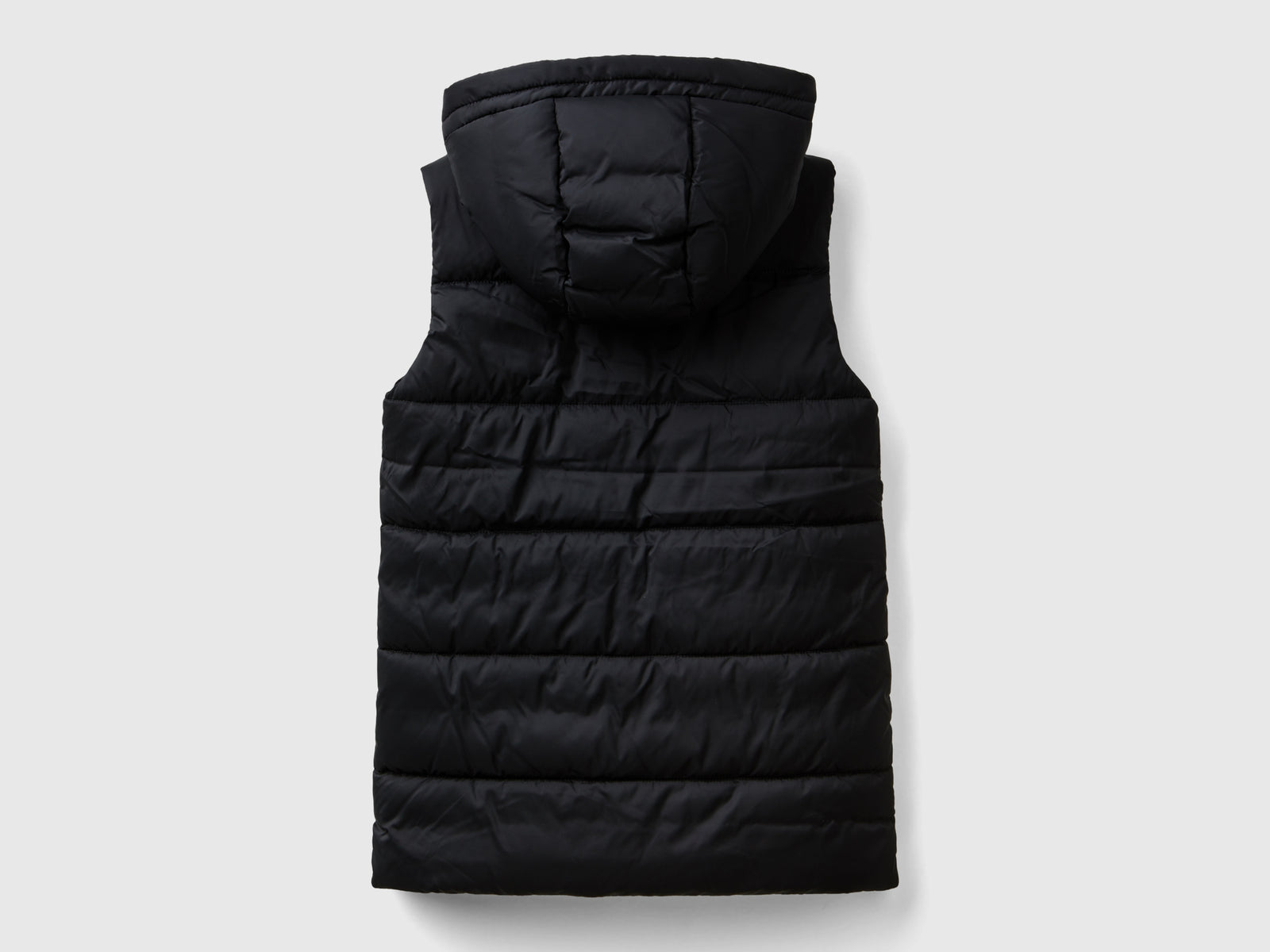 Chaleco acolchado con capucha da bambina nero 2 | Benetton Outlet