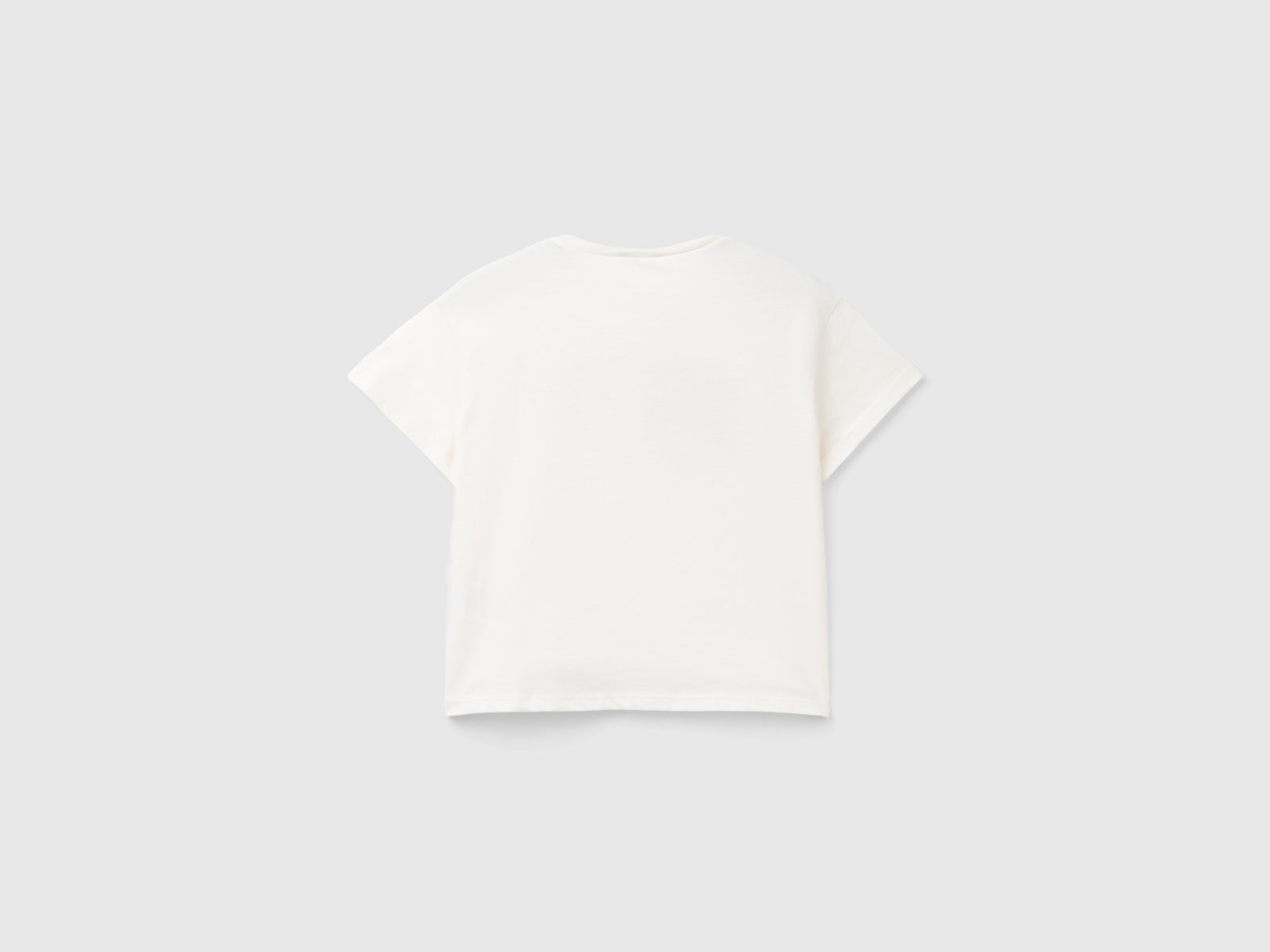 Maglietta stile college da bambina bianco panna 2 | Benetton Outlet