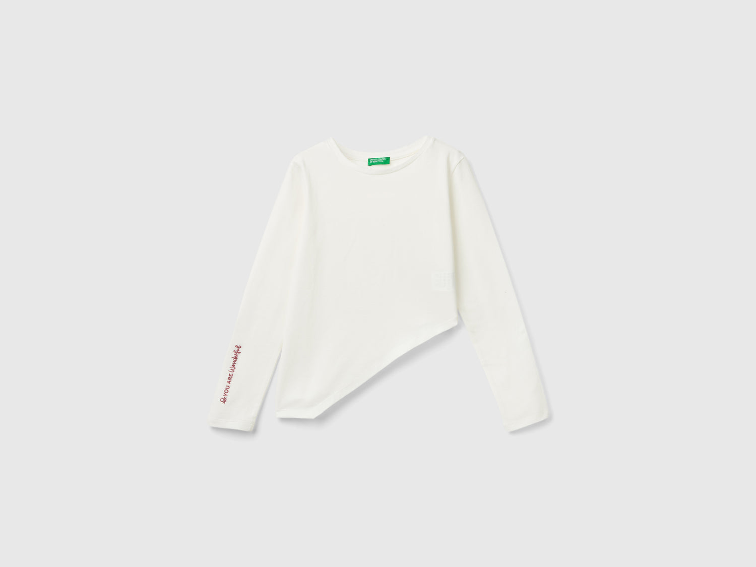 T-shirt with asymmetrical hem da bambina bianco panna | Benetton Outlet