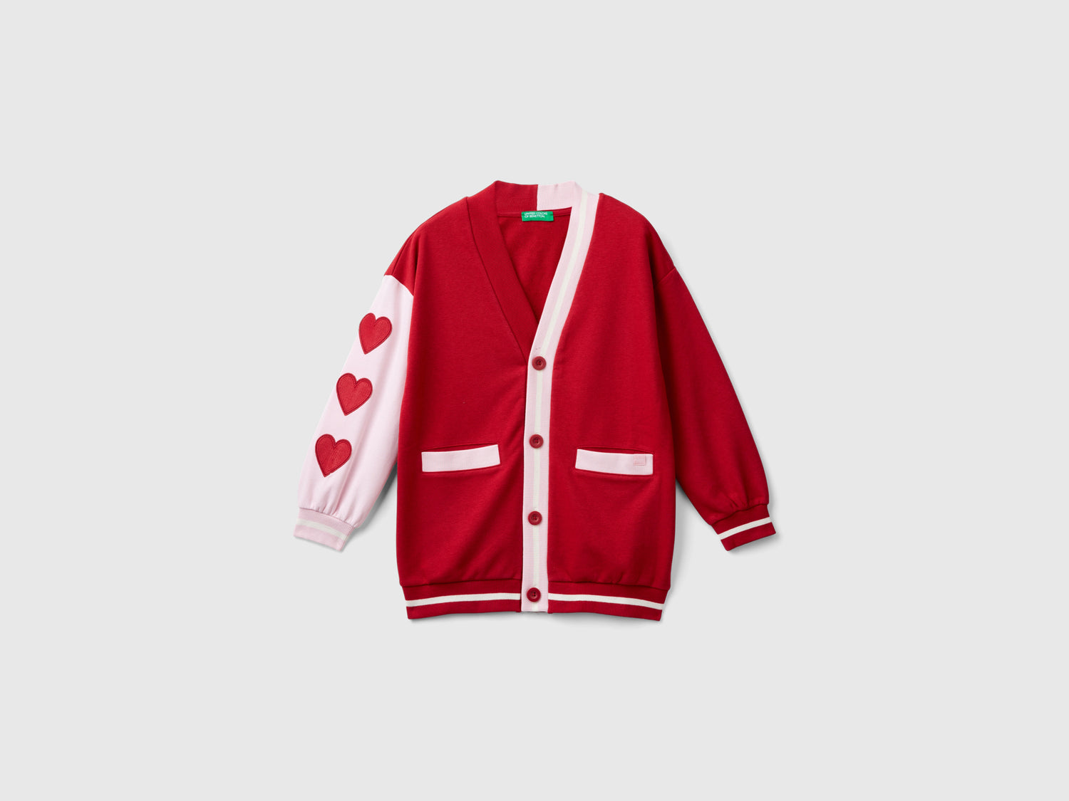 Cardigan in felpa con patch cuori da bambina rosso | Benetton Outlet