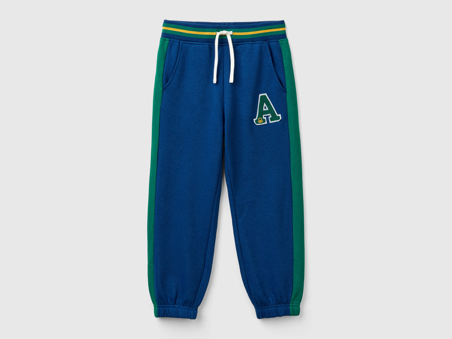 Pantaloni in felpa con bande da bambino blu | Benetton Outlet