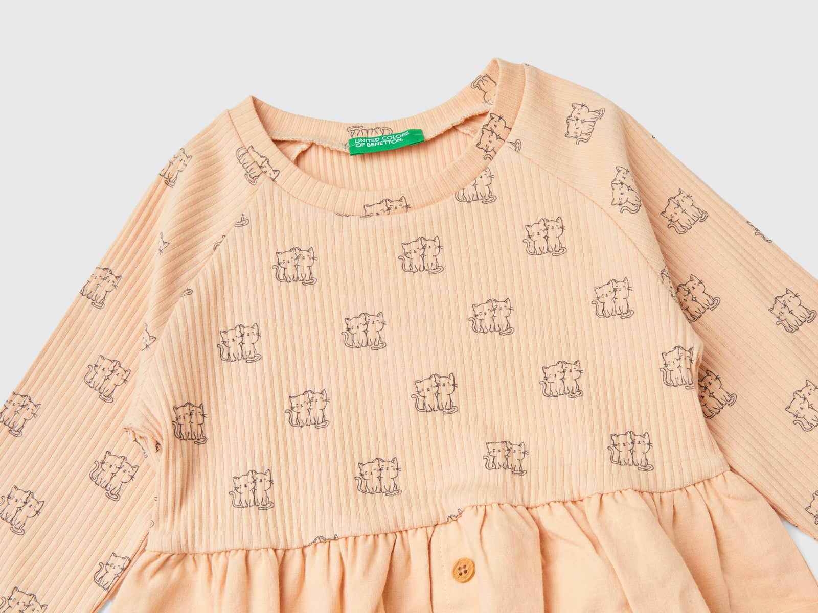 Vestito con stampa e bottoni da bimba pesca 3 | Benetton Outlet