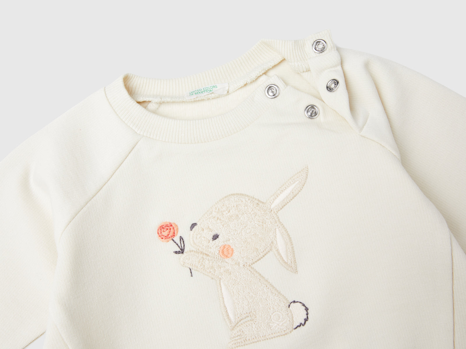 Felpa con ricamo animaletto da neonato bianco panna 3 | Benetton Outlet