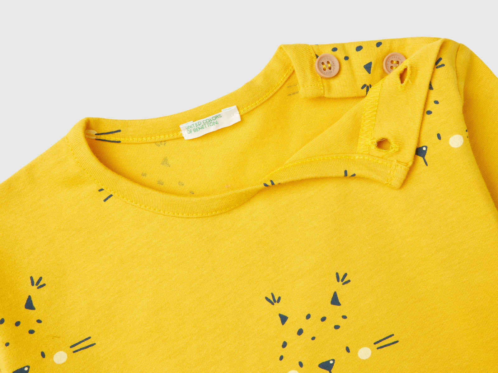 T-shirt fantasia in caldo cotone bio da neonato giallo 3 | Benetton Outlet