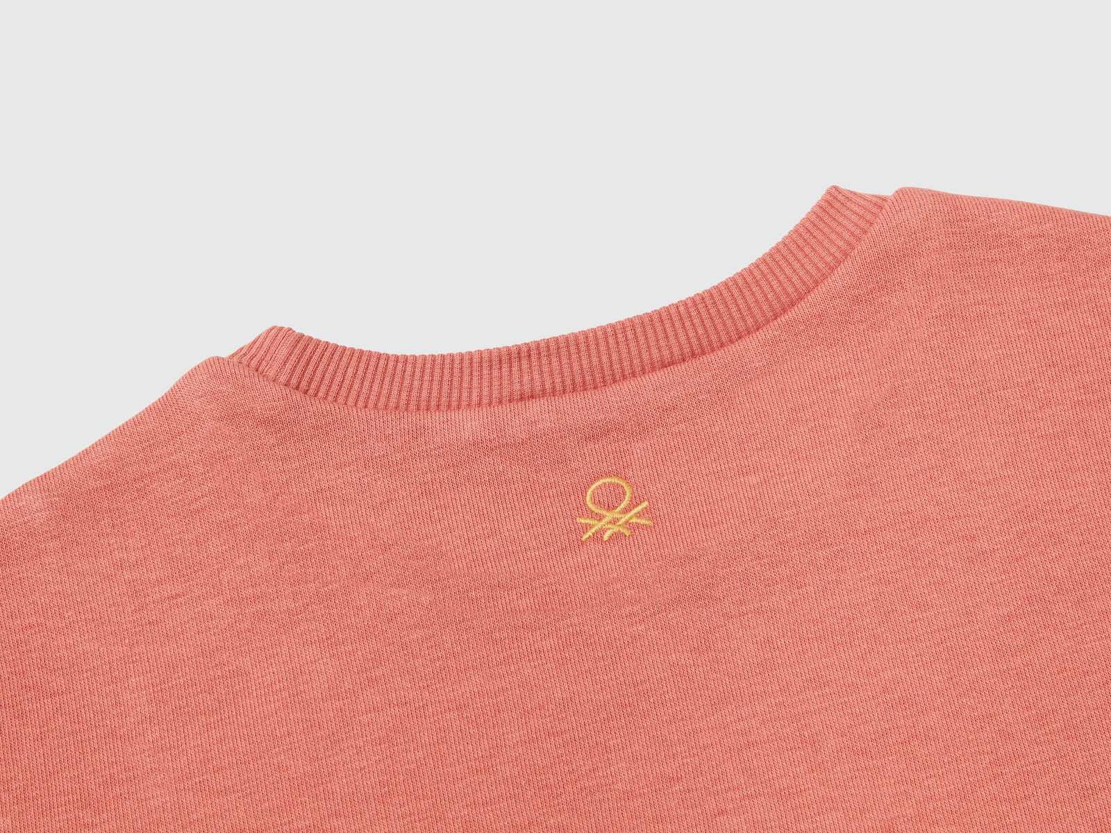 Calda felpa con patch da bimba salmone 3 | Benetton Outlet