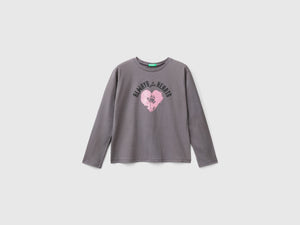 T-shirt con stampa glitter
