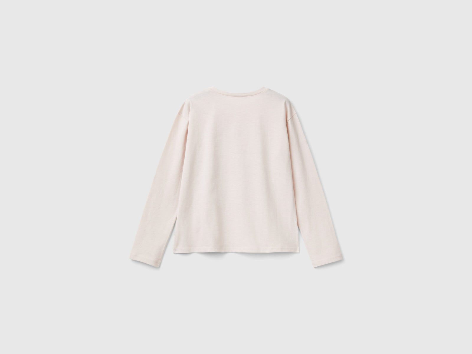 T-shirt con stampa glitter da bambina rosa tenue 2 | Benetton Outlet