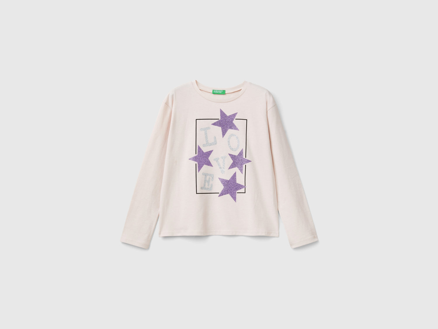T-shirt con stampa glitter da bambina rosa tenue | Benetton Outlet