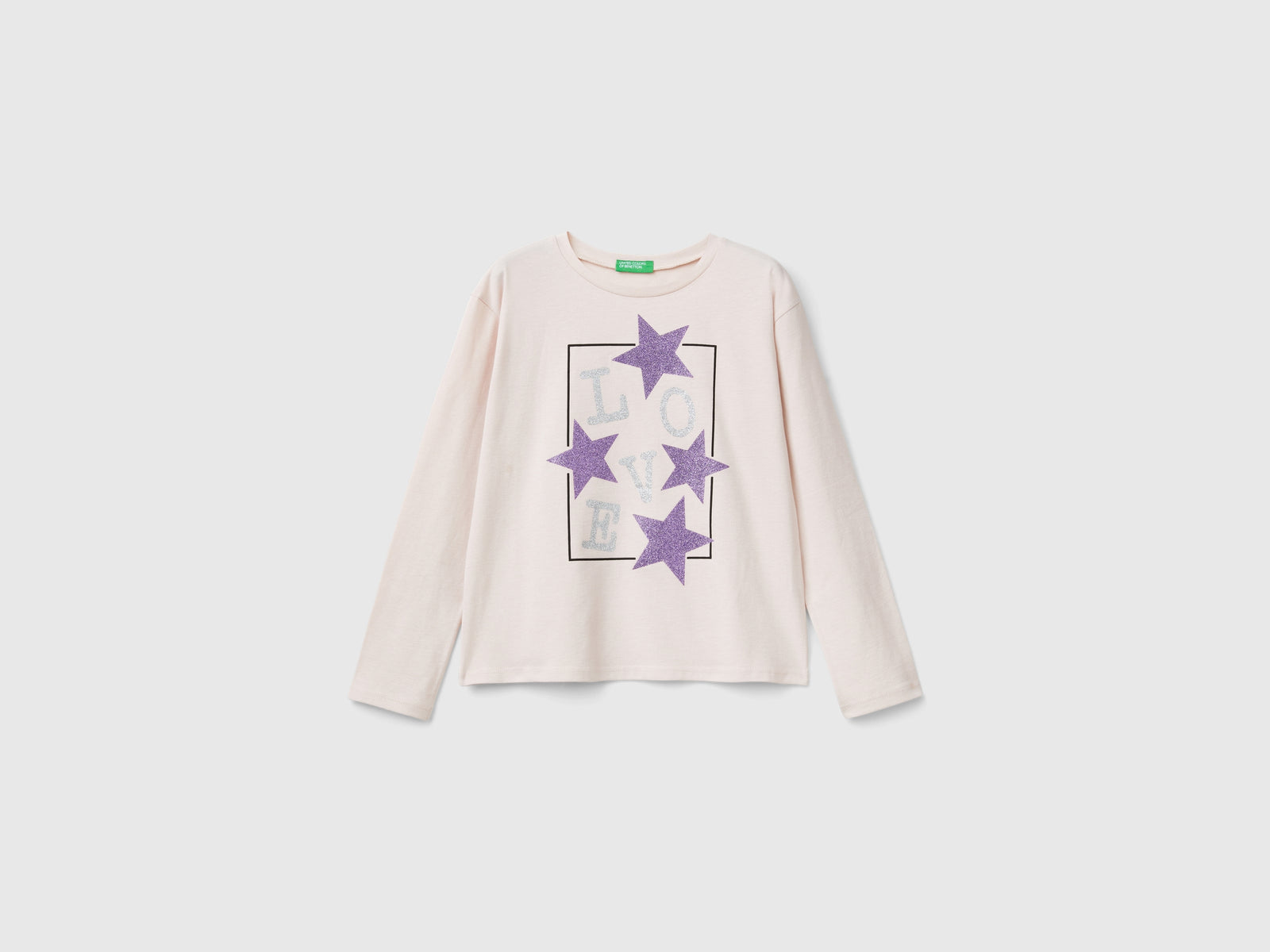 T-shirt con stampa glitter da bambina rosa tenue | Benetton Outlet