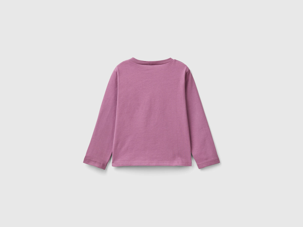 T-shirt con stampa glitter