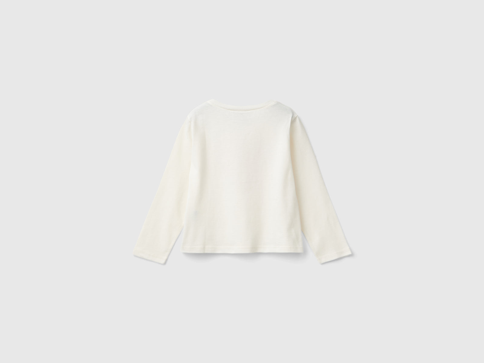 T-shirt panna con stampa laminata Barbie da bimba bianco panna 2 | Benetton Outlet