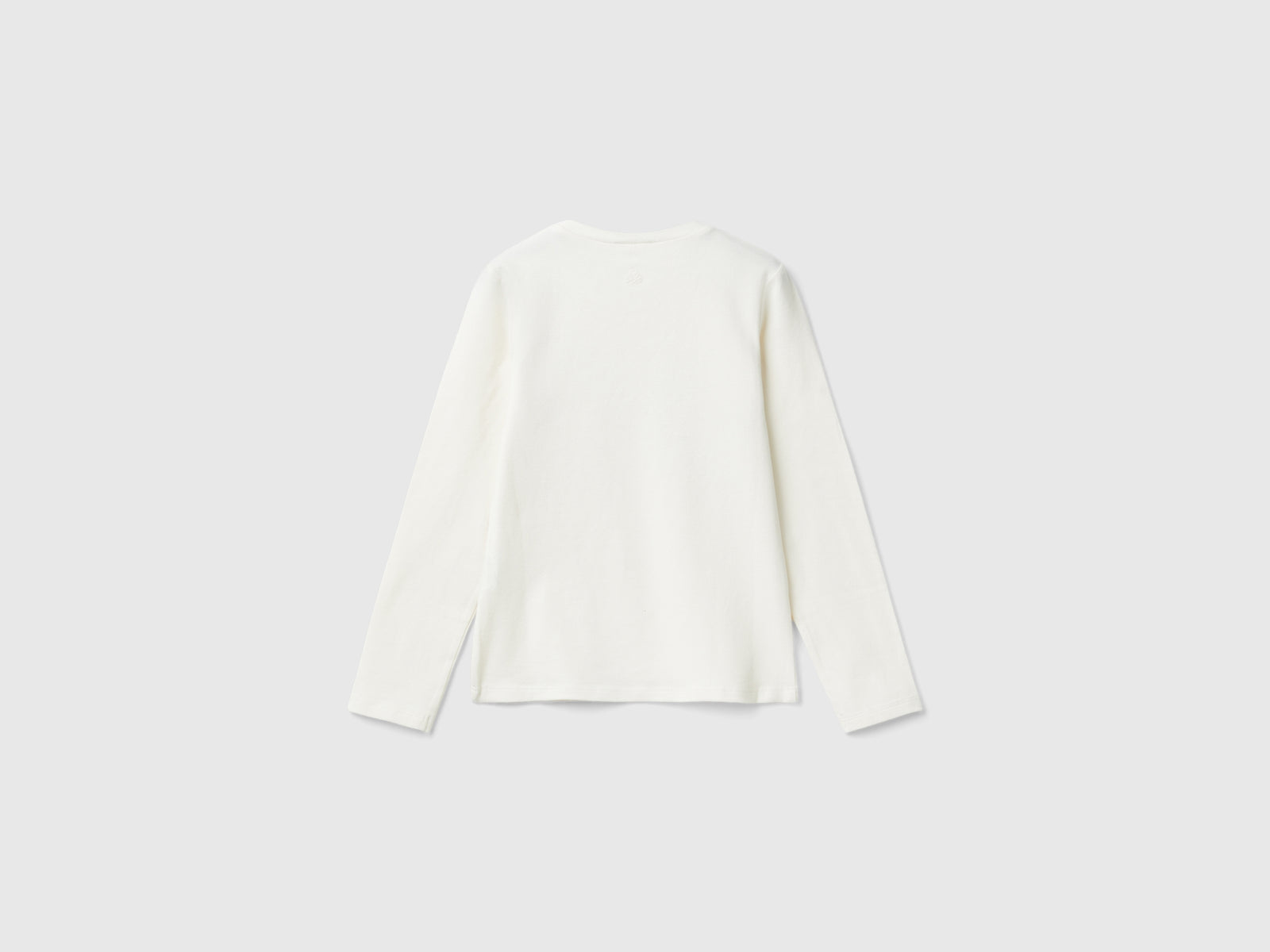 T-shirt con paillettes in cotone bio da bambina bianco panna 2 | Benetton Outlet