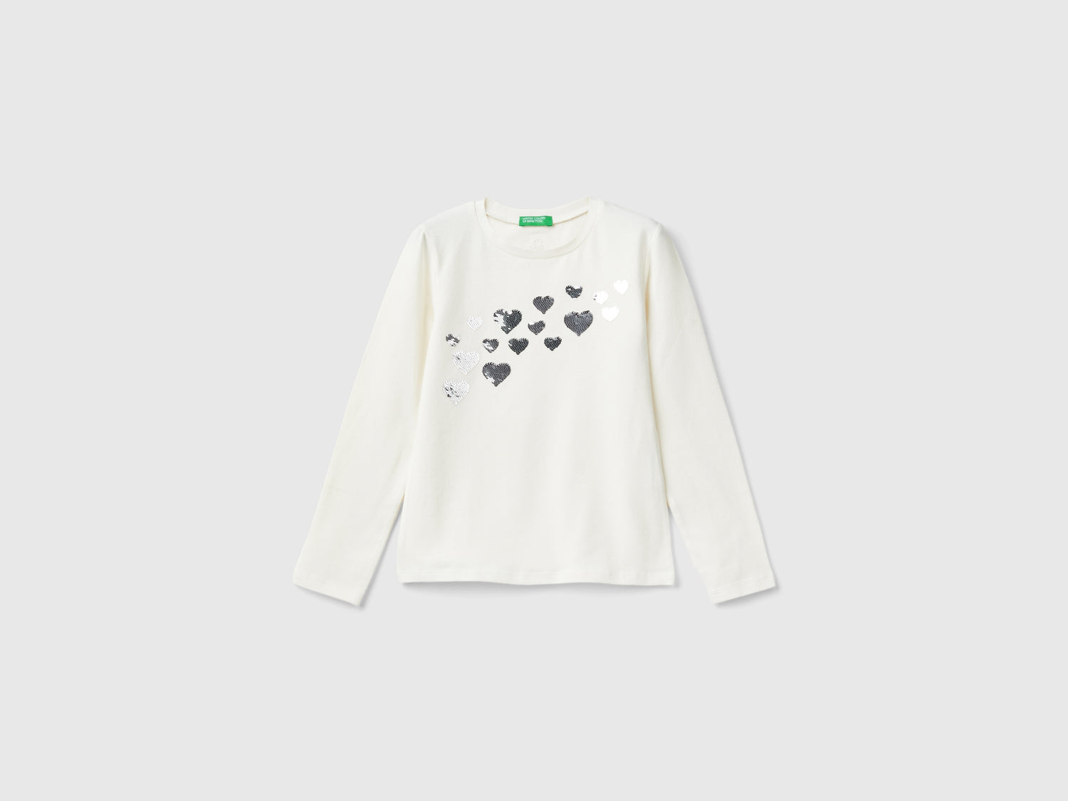 T-shirt con paillettes in cotone bio da bambina bianco panna | Benetton Outlet