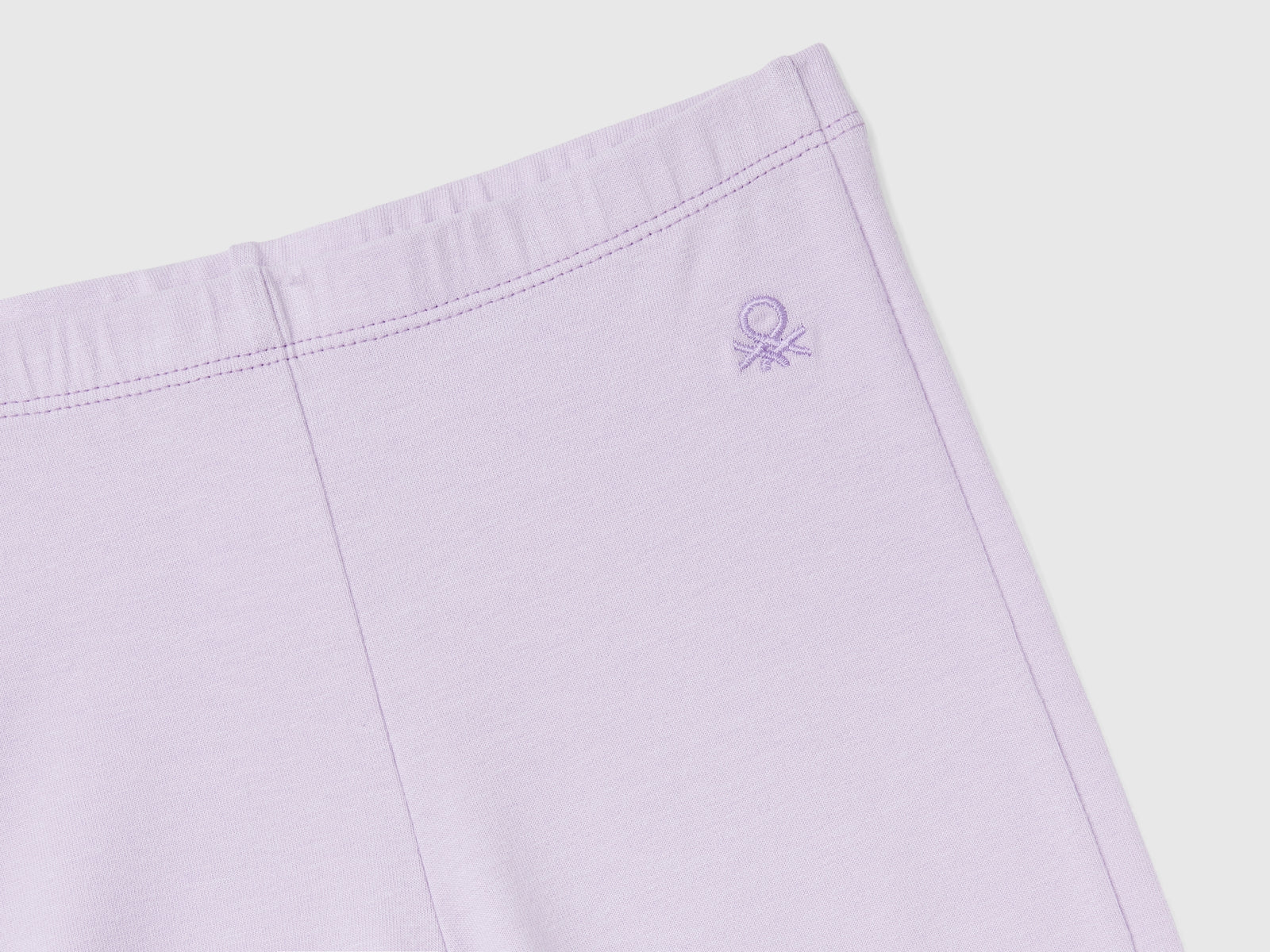 Leggings a zampa in cotone stretch da bambina lilla 3 | Benetton Outlet