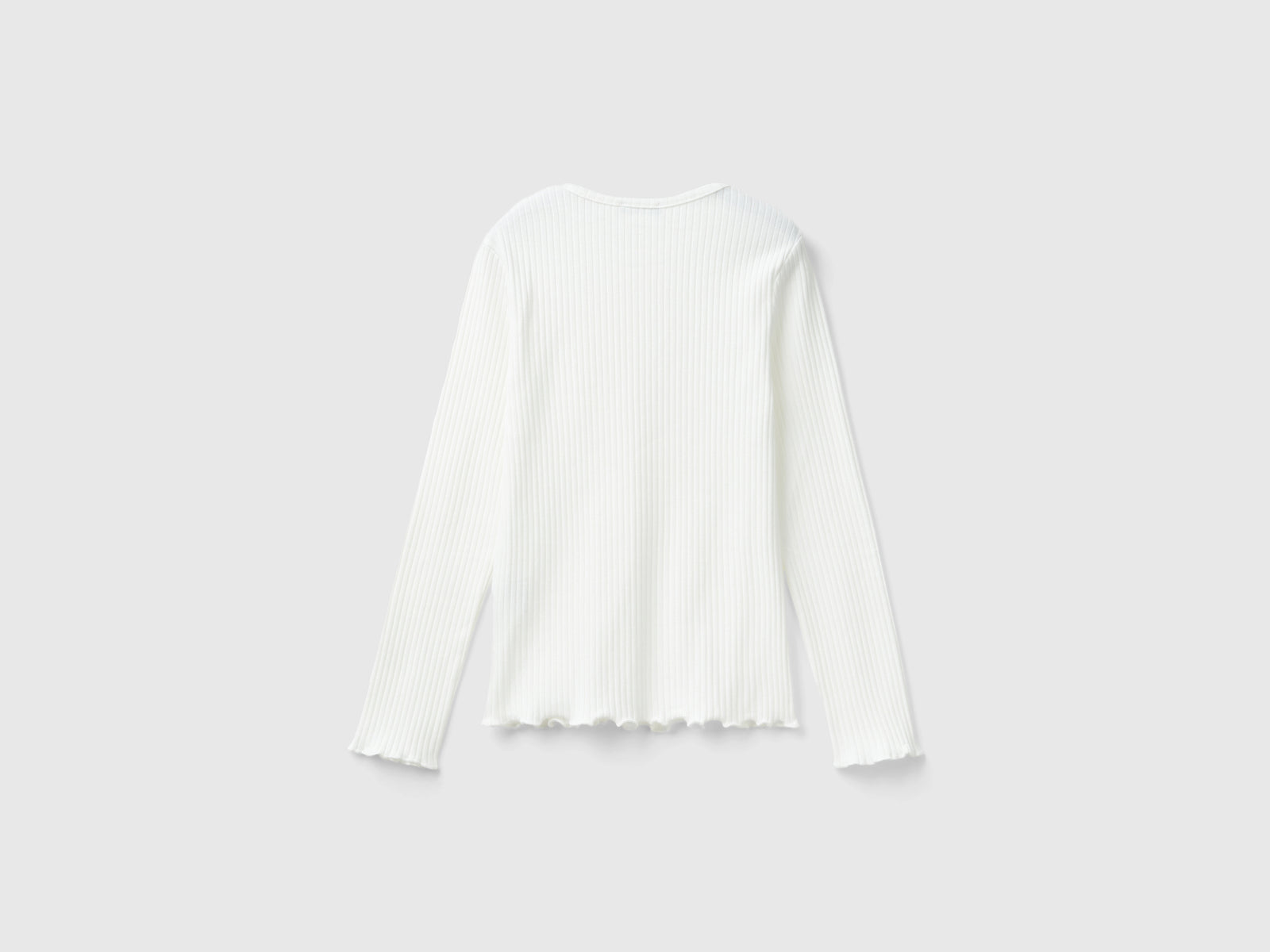 Maglietta slim fit in cotone stretch da bambina bianco panna 2 | Benetton Outlet