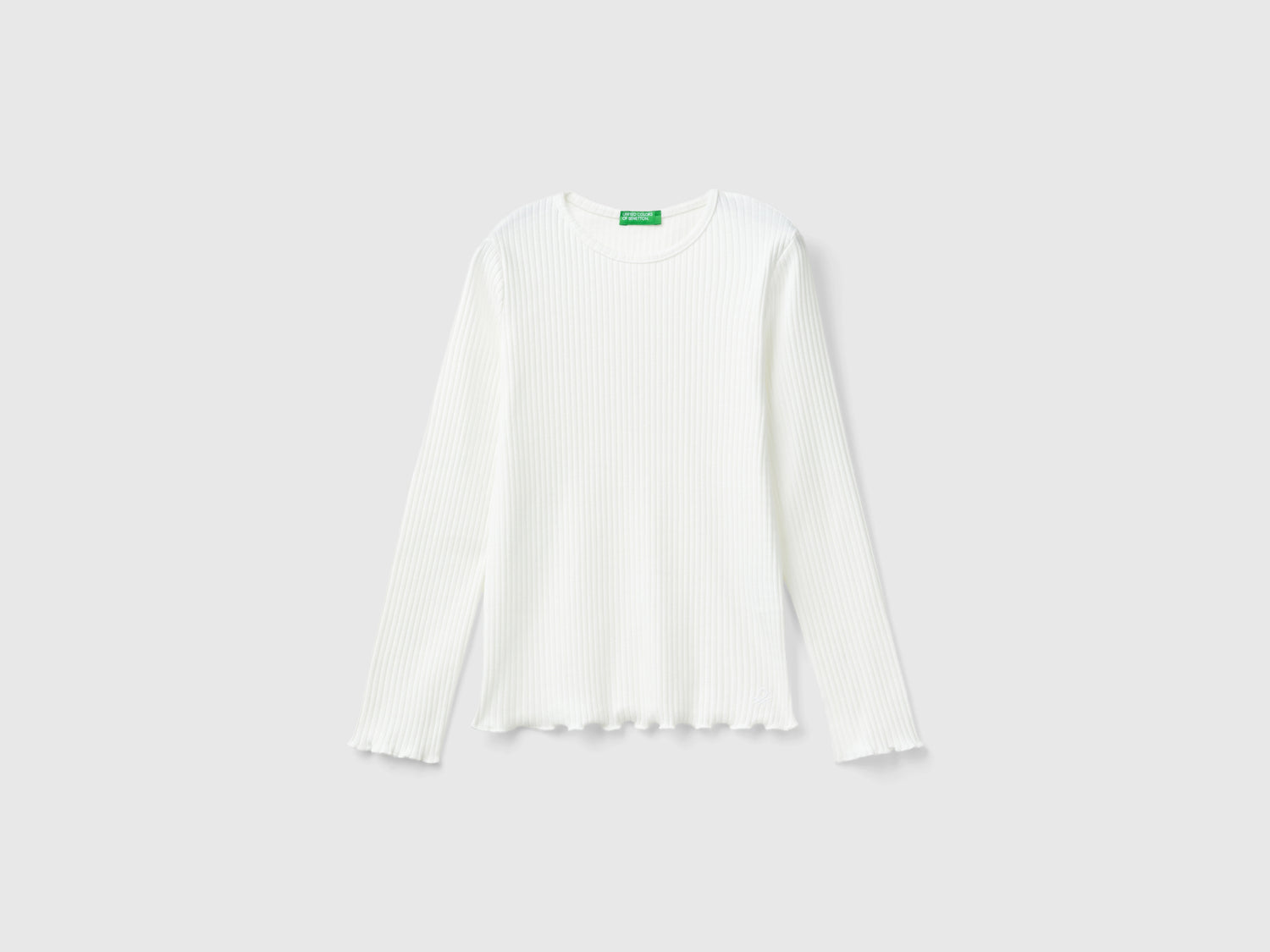 Maglietta slim fit in cotone stretch da bambina bianco panna | Benetton Outlet
