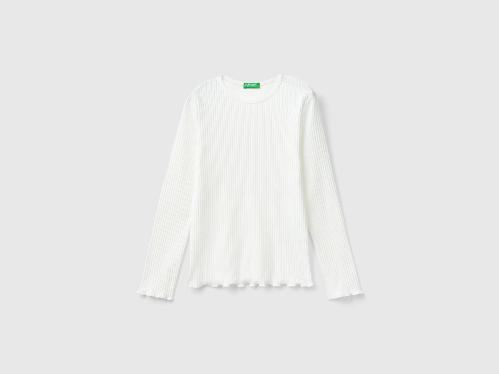 Maglietta slim fit in cotone stretch da bambina bianco panna | Benetton Outlet