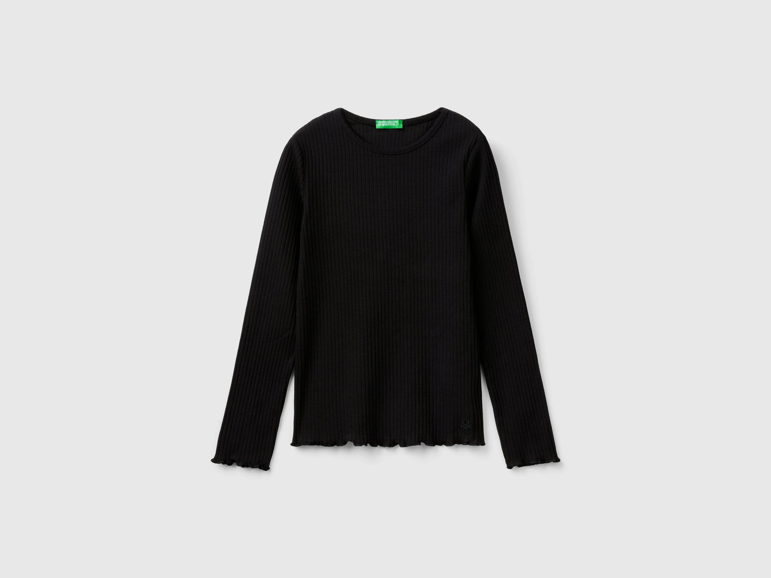 Maglietta slim fit in cotone stretch da bambina nero | Benetton Outlet